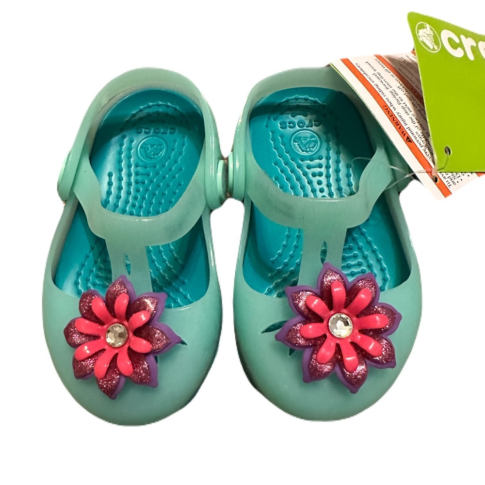 CROCS Kids Sandals in Teal with Pink and Purple Flower
